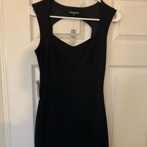 Black backless dress, above the knee
